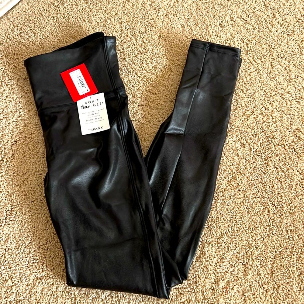 NWT- Spanx faux leather leggings. Black. Size SP